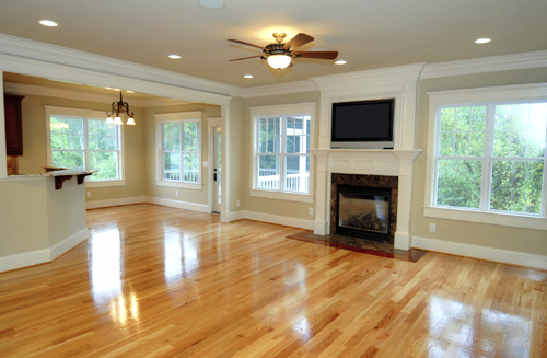 Spacious Room With Hardwood Flooring